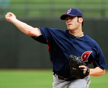 SURPRISE, AZ - MARCH 03:  Pitcher Anthony Reyes #27 the Cleveland Indians warms up against the Kansas City Royals before the start of a spring training game against  at the Surprise Stadium on March 3, 2009 in Surprise, Arizona.  (Photo by Kevork Djansezi