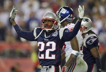 GLENDALE, AZ - FEBRUARY 03:  Cornerback Asante Samuel #22 of the New England Patriots celebrates after breaking-up a pass thrown to wide receiver Plaxico Burress #17 of the New York Giants (not pictured) in the third quarter during Super Bowl XLII on Febr