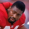 SAN FRANCISCO - DECEMBER 1:  Defensive ends Charles Haley #94 of the San Francisco 49ers takes a rest on the bench during a game against the New Orleans Saints at Candlestick Park on December 1, 1991 in San Francisco, California.  The 49ers won 38-24.  (P