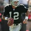 OAKLAND, CA - SEPTEMBER 19:  Quarterback Rich Gannon #12 of the Oakland Raiders scrambles with the ball during the game against the Buffalo Bills at Network Associates Coliseum on September 19, 2004 in Oakland, California. The Raiders defeated the Bills 1