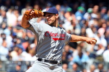 NEW YORK - APRIL 16:  Cliff Lee #31 of the Cleveland Indians pitches against the New York Yankees during opening day at the new Yankee Stadium on April 16, 2009 in the Bronx borough of New York City. This is the first regular season MLB game being played 