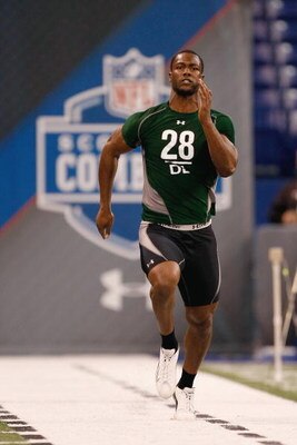 INDIANAPOLIS, IN - FEBRUARY 23:  Defensive lineman Mike Johnson of Georgia Tech runs the 40 yard dash during the NFL Scouting Combine presented by Under Armour at Lucas Oil Stadium on February 23, 2009 in Indianapolis, Indiana. (Photo by Scott Boehm/Getty