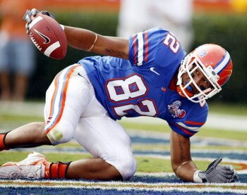 GAINESVILLE, FL - SEPTEMBER 30:  Florida Gators receiver Louis Murphy #82 scores a touchdow  against the Louisiana State Tigers at Ben Hill Griffin Stadium on October 7, 2006 in Gainesville, Florida.  (Photo by Marc Serota/Getty Images)