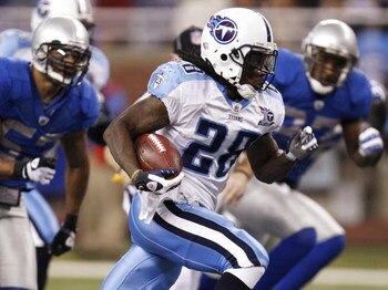 DETROIT, MI - NOVEMBER 27:  Chris Johnson #28 of the Tennessee Titans runs for a first quarter touchdown while playing the Detroit Lions on November 27, 2008 at Ford Field in Detroit, Michigan.  (Photo by Gregory Shamus/Getty Images)