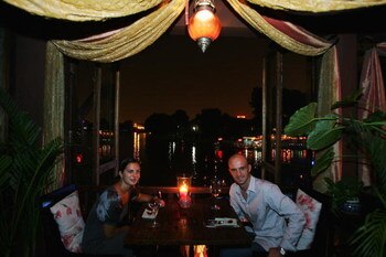 BEIJING - SEPTEMBER 9:  Tennis player Ivan Ljubicic (R) of Croatia and his wife, Aida, dine at a restaurant along Shishahai Lake September 9, 2007 in Beijing, China. Ljubicic is taking part in the China Tennis Open in Beijing.  (Photo by Andrew Wong/Getty