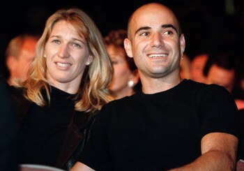 357398 01: FILE PHOTO: (PUERTO RICO OUT) Tennis stars Andre Agassi and Steffi Graf attend the Oscar De La Hoya versus Felix Trinidad welterweight championship fight September 18, 1999 at the Mandalay Bay Hotel in Las Vegas, NV. Graf gave birth to a health