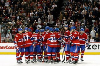 MONTREAL- APRIL 22: Members of the Montreal Canadiens huddle after being defeated by the Boston Bruins 4-1 after Game Four of the Eastern Conference Quarterfinals of the 2009 Stanley Cup Playoffs at the Bell Centre on April 22, 2009 in Montreal, Quebec,