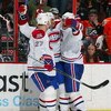 PHILADELPHIA - FEBRUARY 27:  Mathieu Schneider #24 (C) of the Montreal Canadiens is mobbed by teammates Alexei Kovalev #27 and Andrei Markov #79 after scoring the overtime goal against the Philadelphia Flyers on February 27, 2009 at Wachovia Center in Phi
