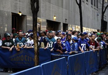 NEW YORK - APRIL 25:  NFL football fans wait for admission to Radio City Music Hall for the 2009 NFL Draft on April 25, 2009 in New York City  (Photo by Jeff Zelevansky/Getty Images)