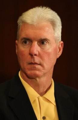 GREEN BAY, WI - MARCH 06: General manager Ted Thompson of the Green Bay Packers listens as quarterback Brett Favre announces his retirement at a press conference on March 6, 2008 at Lambeau Field in Green Bay, Wisconsin. (Photo by Jonathan Daniel/Getty Im
