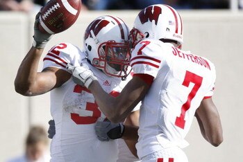 EAST LANSING, MI - NOVEMBER 01:  John Clay #32 of the Wisconsin Badgers celebrates a fourth quarter touchdown with Kyle Jefferson #7 while playing the Michigan State Spartans on November 1, 2008 at Spartan Stadium in East Lansing, Michigan. Michigan State