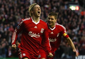 LIVERPOOL, UNITED KINGDOM - APRIL 08:  Fernando Torres of Liverpool celebrates scoring the opening goal with team mate Steven Gerrard (R) during the UEFA Champions League Quarter Final First Leg match between Liverpool and Chelsea at Anfield on April 8, 2