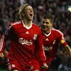 LIVERPOOL, UNITED KINGDOM - APRIL 08:  Fernando Torres of Liverpool celebrates scoring the opening goal with team mate Steven Gerrard (R) during the UEFA Champions League Quarter Final First Leg match between Liverpool and Chelsea at Anfield on April 8, 2