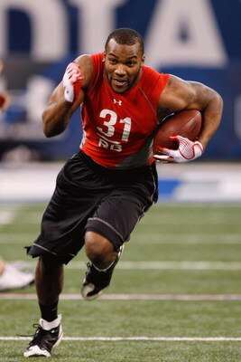 INDIANAPOLIS, IN - FEBRUARY 22:  Running back Beanie Wells of Ohio State runs with the football during the NFL Scouting Combine presented by Under Armour at Lucas Oil Stadium on February 22, 2009 in Indianapolis, Indiana. (Photo by Scott Boehm/Getty Image