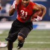 INDIANAPOLIS, IN - FEBRUARY 22:  Running back Beanie Wells of Ohio State runs with the football during the NFL Scouting Combine presented by Under Armour at Lucas Oil Stadium on February 22, 2009 in Indianapolis, Indiana. (Photo by Scott Boehm/Getty Image
