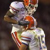 MIAMI - JANUARY 08:  Percy Harvin #1 of the Florida Gators celebrates with quarterback Tim Tebow #15 during the FedEx BCS National Championship Game against the Oklahoma Sooners at Dolphin Stadium on January 8, 2009 in Miami, Florida.  (Photo by Donald Mi