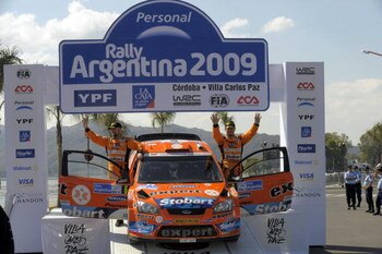 CORDOBA, ARGENTINA - APRIL 26:  Henning Solberg of Norway and Cato Menkerud of Norway in the final podium of the WRC Argentina Rally on April 26, 2009 in Cordoba, Argentina.  (Photo by Massimo Bettiol/Getty Images)