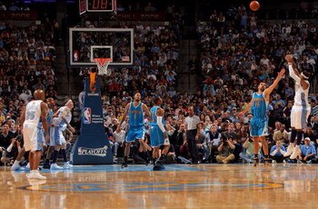 DENVER - APRIL 19:  Carmelo Antony #15 of the Denver Nuggets takes a shot over Peja Stojakovic #16 of the New Orleans Hornets in Game One of the Western Conference Quarterfinals during the 2009 NBA Playoffs at Pepsi Center on April 19, 2009 in Denver, Col