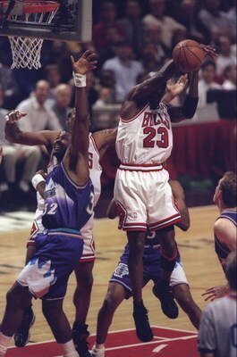 10 Jun 1998:  Michael Jordan #23 of the Chicago Bulls in action against Karl Malone #32 of the Utah Jazz during the NBA Finals Game 4 at the United Center in Chicago, Illinois.  The Bulls defeated the Jazz 86-82. Mandatory Credit: Jonathan Daniel  /Allspo
