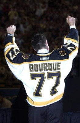 4 Oct 2001:  Ray Bourque #77 of the Boston Bruins during a ceremony in which the Bruins retired his number 77 before their home opener against the Anaheim Mighty Ducks at the Fleet Center in Boston, Massachusetts. <DIGITAL IMAGE>    Mandatory Credit: Ezra