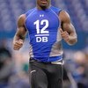 INDIANAPOLIS, IN - FEBRUARY 24:  Defensive back Vontae Davis of Illinois runs the 40 yard dash during the NFL Scouting Combine presented by Under Armour at Lucas Oil Stadium on February 24, 2009 in Indianapolis, Indiana. (Photo by Scott Boehm/Getty Images