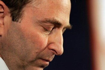 NEW YORK - FEBRUARY 16:  National Hockey League Commissioner Gary Bettman looks down as he announces that the 2004-05 season is being canceled during a news conference at the Westin New York, Times Square, February 16, 2005 in New York City. The NHL becom