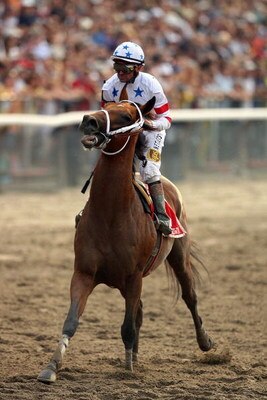 ELMONT, NY - JUNE 07:  Big Brown ridden by jockey Kent Desormeaux, limps down the final stretch of the 140th running of the Belmont Stakes at Belmont Park on June 7, 2008 in Elmont, New York.  (Photo by Al Bello/Getty Images)