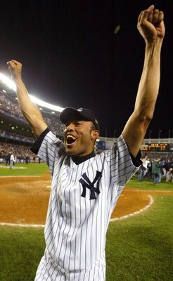 BRONX, NY - OCTOBER 16:  Mariano Rivera #42 of the New York Yankees celebrates after teammate Aaron Boone hit the game winning home run in the bottom of the eleventh inning against the Boston Red Sox during game 7 of the American League Championship Serie