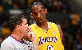 LOS ANGELES, CA - APRIL 28:  Kobe Bryant #8 of the Los Angeles Lakers talks to referee Tim Donaghy #21, in the first half against the Phoenix Suns in Game Three of the Western Conference Quarterfinals during the 2006 NBA Playoffs April 28, 2006 at Staples