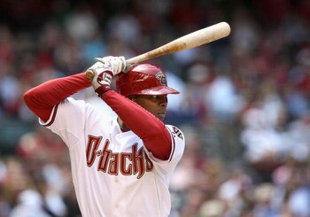 PHOENIX - APRIL 15:  Justin Upton #10 of the Arizona Diamondbacks bats against the St. Louis Cardinals during the game at Chase Field on April 15, 2009 in Phoenix, Arizona. The Cardinals defeated the Diamondbacks 12-7.  (Photo by Christian Petersen/Getty 