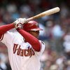 PHOENIX - APRIL 15:  Justin Upton #10 of the Arizona Diamondbacks bats against the St. Louis Cardinals during the game at Chase Field on April 15, 2009 in Phoenix, Arizona. The Cardinals defeated the Diamondbacks 12-7.  (Photo by Christian Petersen/Getty 