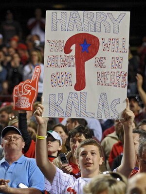 PHILADELPHIA - APRIL 17: A Philadelphia Phillies fan holds up a sign in honor of recently departed Philadelphia Phillies announcer Harry Kalas during the game the San Diego Padres and Philadelphia Phillies on April 17, 2009 in Philadelphia, Pennsylvania. 