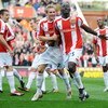 STOKE, UNITED KINGDOM - APRIL 11:  Abdoulaye Faye of Stoke City celebrates with Liam Lawrence as he scores their first goal during the Barclays Premier League match between Stoke City and Newcastle United at the Britannia Stadium on April 11, 2009 in Stok