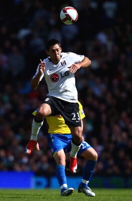 LONDON, ENGLAND - APRIL 25:  Clint Dempsey of Fulham heads the ball during the Barclays Premier League match between Fulham and Stoke City at Craven Cottage on April 25, 2009 in London, England.  (Photo by Ryan Pierse/Getty Images)