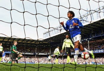 LIVERPOOL, UNITED KINGDOM - APRIL 05:  Jo of Everton celebrates after scoring the third goal as Chris Kirkland of Wigan Athletic looks on during the Barclays Premier League match between Everton and Wigan Athletic at Goodison Park on April 5, 2009 in Ever