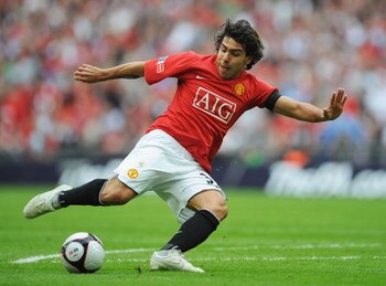 LONDON, ENGLAND - APRIL 19:  Carlos Tevez of Manchester United in action during the FA Cup sponsored by E.ON Semi Final match between Everton and Manchester United at Wembley Stadium on April 19, 2009 in London, England.  (Photo by Shaun Botterill/Getty I