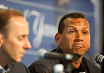 TAMPA - FEBRUARY 17: Infielder Alex Rodriguez (R) of the New York Yankees talks during a press conference as General manager Brian Cashman listens February 17, 2008 at the George M. Steinbrenner Field in Tampa, Florida. The Yankees third baseman admitted 