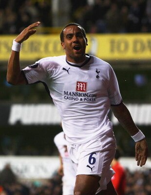 LONDON - DECEMBER 18:  Tom Huddlestone of Spurs celebrates after scoring a goal to level the scores at 2-2 during the UEFA Cup Group D match between Tottenham Hotspur and Spartak Moscow at White Hart Lane on December 18, 2008 in London, England.  (Photo b