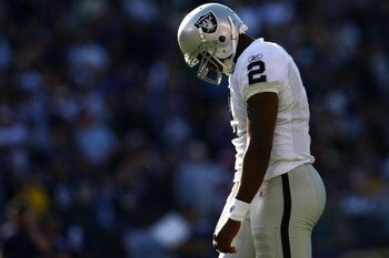 BALTIMORE - OCTOBER 26:  JaMarcus Russell #2 of the Oakland Raiders returns to the field after a time out against the Baltimore Ravens during the game at M&T Bank Stadium October 26, 2008 in Baltimore, Maryland.  (Photo by Chris McGrath/Getty Images)