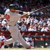 PHOENIX - APRIL 15:  Albert Pujols of the St. Louis Cardinals hits an RBI fielder's choice against the Arizona Diamondbacks during the fourth inning of the game at Chase Field April 15, 2009 in Phoenix, Arizona. All Major League Baseball players are weari