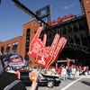 ST. LOUIS - APRIL 1:  A vendor sells foam fingers and pennants outside Busch Stadium before the St. Louis Cardinals game against the New York Mets during their Opening Day game on April 1, 2007 at Busch Stadium in St. Louis, Missouri.  The Mets beat the C