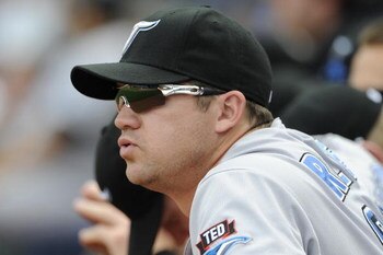 KANSAS CITY, MO - APRIL 30:  Scott Rolen #33 of the Toronto Blue Jays looks on from the dugout against the Kansas City Royals on April 30, 2009 at Kauffman Stadium in Kansas City, Missouri. The Royals won 8-6. (Photo by G. Newman Lowrance/Getty Images)