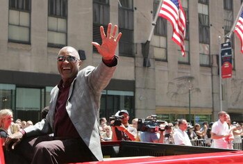 NEW YORK - JULY 15:  Ozzie Smith acknowledges the fans during the MLB All-Star Game Red Carpet Parade on July 15, 2008 in New York City. (Photo by Mike Stobe/Getty Images)