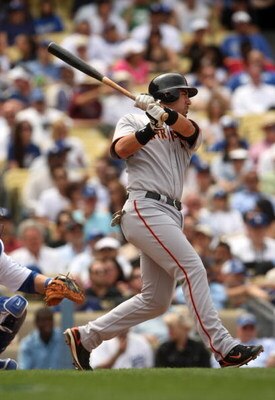 LOS ANGELES, CA - APRIL 13:  Travis Ishikawa #10 of the San Francisco Giants bats against the Los Angeles Dodgers on April 13, 2009 at Dodger Stadiium in Los Angeles, California.  The Dodgers won 11-1.  (Photo by Stephen Dunn/Getty Images)