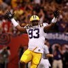 NEW ORLEANS - JANUARY 07:  Tyson Jackson #93 of the Louisiana State University Tigers celebrates during the AllState BCS National Championship against the Ohio State Buckeyes on January 7, 2008 at the Louisiana Superdome in New Orleans, Louisiana.  (Photo