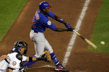 NEW YORK - SEPTEMBER 24:  Alfonso Soriano #12 of the Chicago Cubs bats against the New York Mets at Shea Stadium September 24, 2008 in the Flushing neighborhood of the Queens borough of New York City.  (Photo by Jim McIsaac/Getty Images)