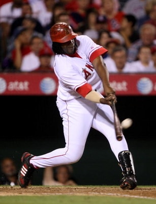 ANAHEIM, CA - SEPTEMBER 08: VladimirGuerrero #27 of the Los Angeles Angels of Anaheim hits a three-run home run in the sixth inning against the New York Yankees on September 8, 2008 at Angel Stadium in Anaheim, California.  (Photo by Stephen Dunn/Getty Im