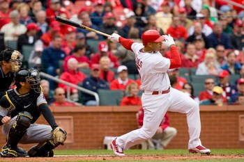 ST. LOUIS - APRIL 9: Albert Pujols #5 of the St. Louis Cardinals follows through on his swing during the MLB game against the Pittsburgh Pirates on April 9, 2009 at Busch Stadium in St. Louis, Missouri.  The Cardinals defeated the Pirates 2-1.  (Photo by 