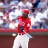 15 Mar 2000:  Ken Griffey Jr. #30 of the Cincinnati Reds hits the ball during the Spring Training Game against the Boston Red Sox at the Ed Smith Stadium in Sarasota, Florida. The Red Sox defeated the Reds 8-1. Mandatory Credit: Harry How  /Allsport