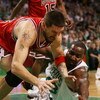 BOSTON - APRIL 28:  Brad Miller #52 of the Chicago Bulls Kendrick Perkins #43 of the Boston Celtics go after the loose ball in Game Five of the Eastern Conference Quarterfinals during the 2009 NBA Playoffs at TD Banknorth Garden on April 28, 2009 in Bosto